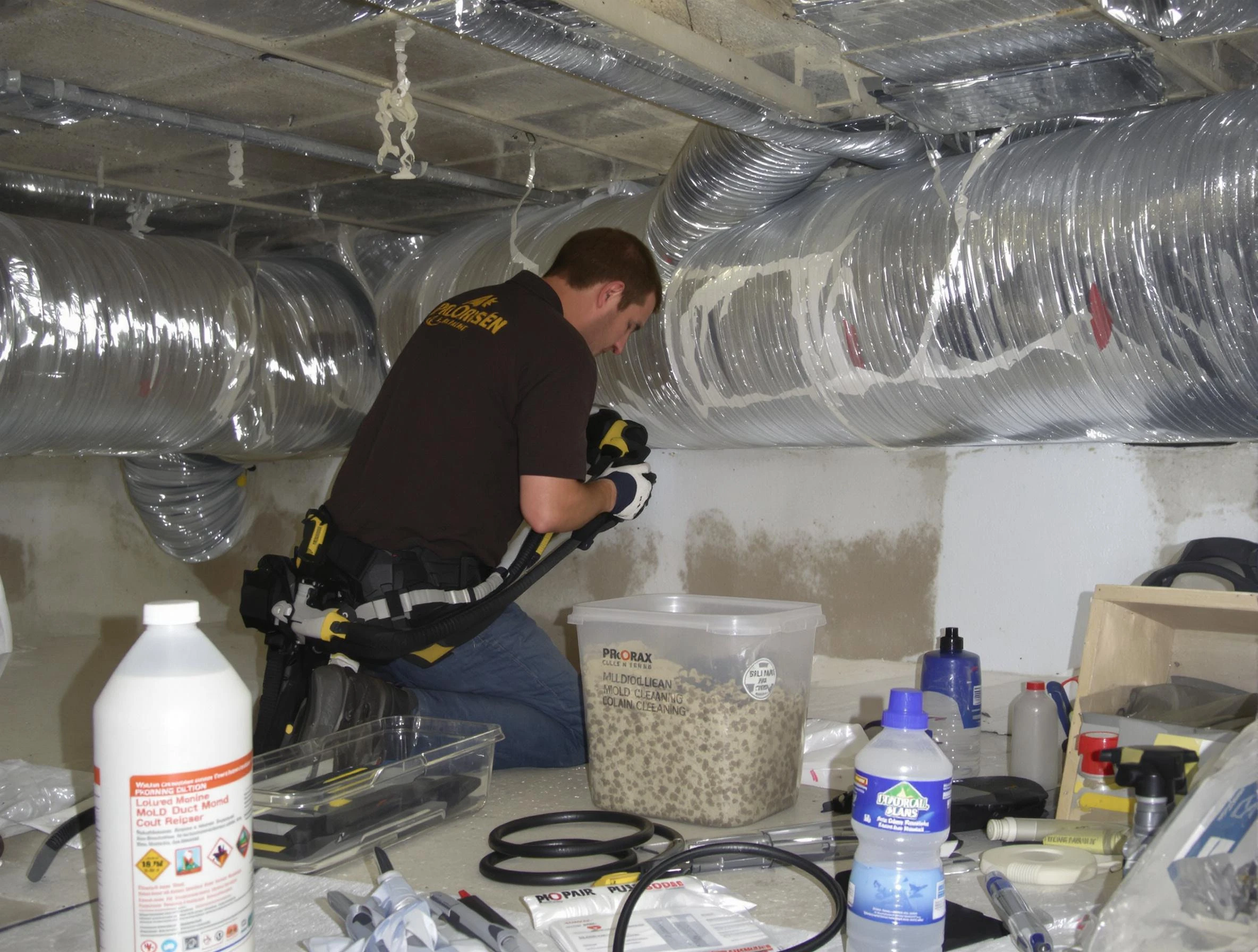 Orange Air Duct Cleaning specialist performing professional mold removal from air ducts in Orange